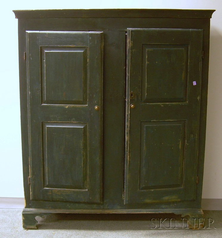 Appraisal: Blue-painted Pine Two-Door Paneled Cupboard the interior with two fixed