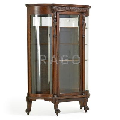 Appraisal: GOLDEN OAK CHINA CABINET Partial mirrored back three shelves ca