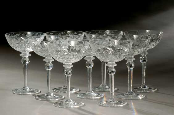 Appraisal: NINE EUROPEAN GLASSES Nine old European moulded champagne glasses with