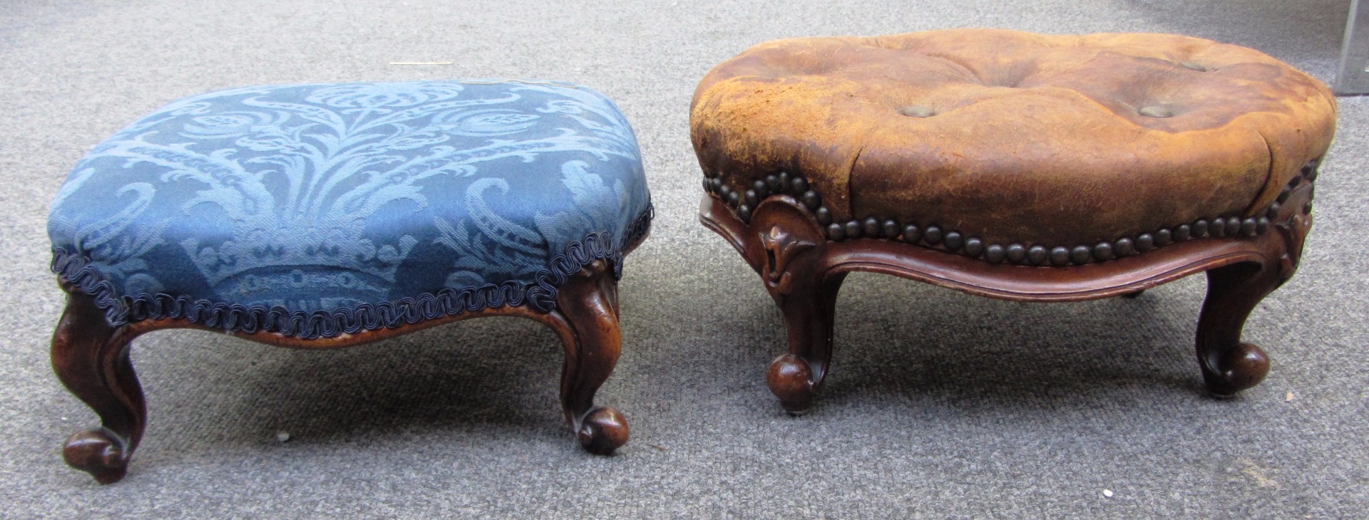 Appraisal: A Victorian mahogany framed small footstool of serpentine outline on