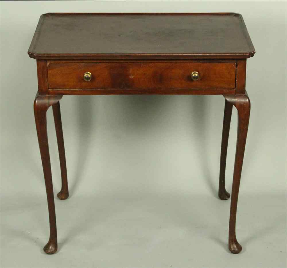 Appraisal: GEORGIAN MAHOGANY TEA TABLE having a rectangular form with a