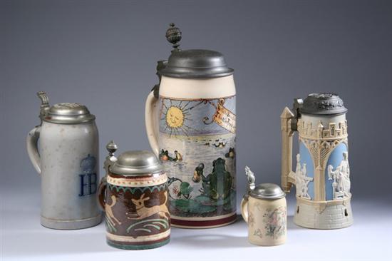 Appraisal: FIVE GERMAN PEWTER-MOUNTED CERAMIC BEER STEINS One litre depicting drinking