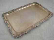 Appraisal: A rectangular silver tray with applied vine border marked approx