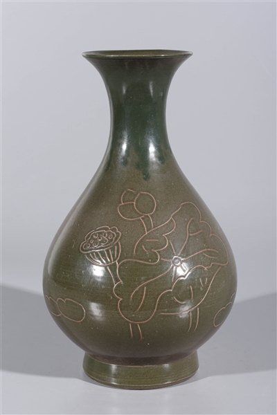 Appraisal: Chinese ceramic celadon glazed vase with incised floral designs overall