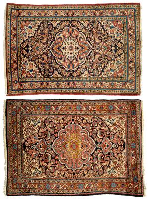 Appraisal: Two similar Dergazine rugs both with central medallions on dark