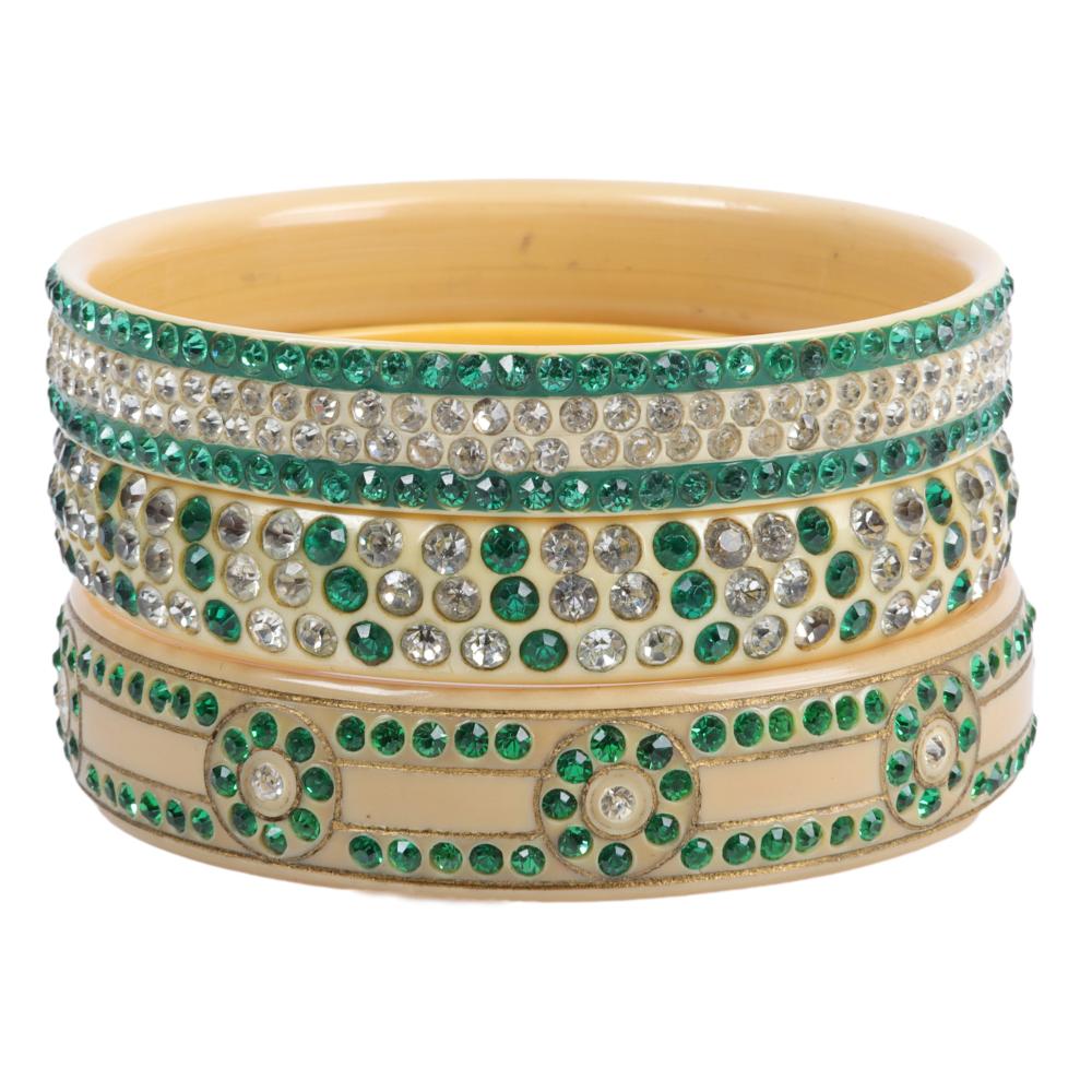 Appraisal: THREE CREAM AND GREEN CELLULOID SPARKLER BANGLE BRACELETS INNER DIAM