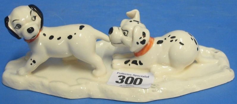 Appraisal: Royal Doulton Disney Figure Lucky and Freckles on ice DM