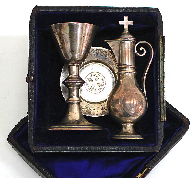 Appraisal: A VICTORIAN SILVER TRAVELLING COMMUNION SET in a fitted case