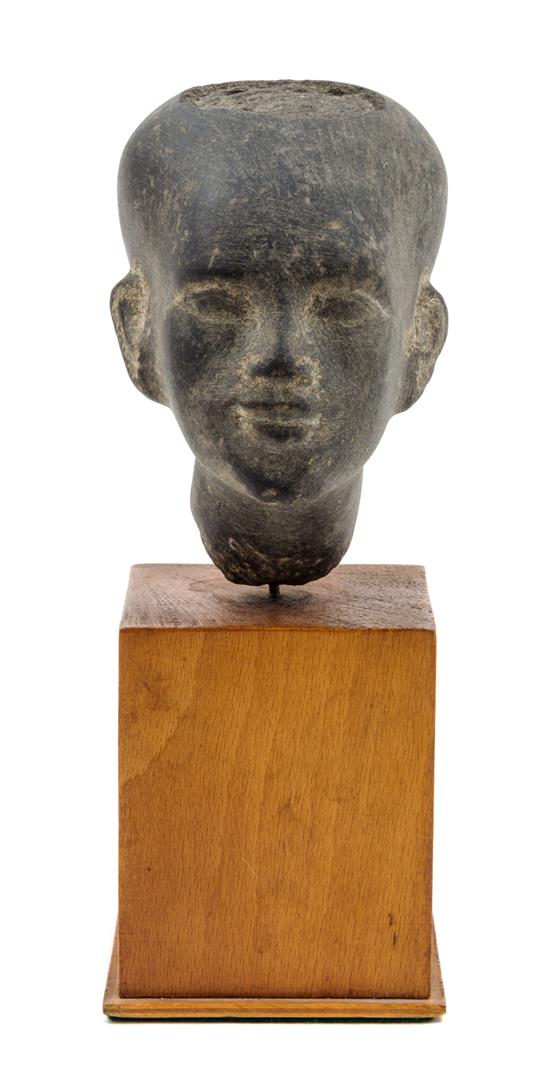 Appraisal: Sale Lot An Egyptian Stone Head of a Woman raised