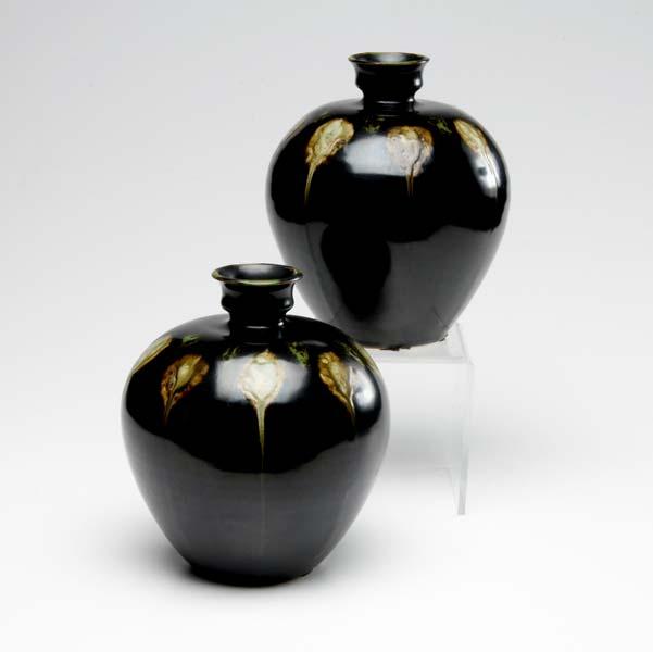 Appraisal: JAPANESE VASES The pair with black glaze and oil spot