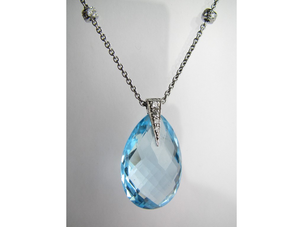 Appraisal: Blue topaz pendant in diamond set mount with multi-faceted blue