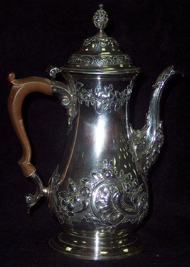 Appraisal: A George II pear shaped coffee pot embossed at a