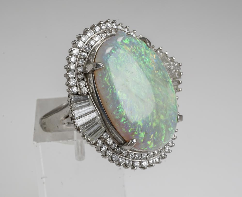 Appraisal: PLATINUM OPAL AND DIAMOND RINGPlatinum Opal and Diamond Ring Centered