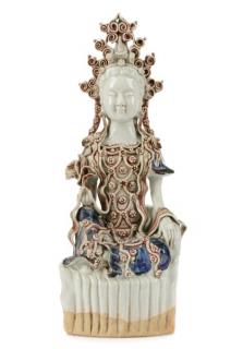 Appraisal: Chinese Porcelain Figure of Guanyin Seated A molded Chinese glazed