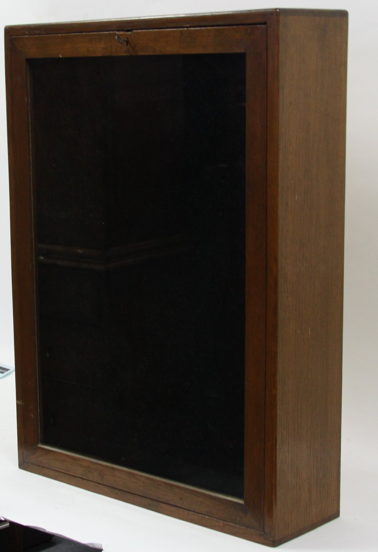 Appraisal: An oak glazed display cupboard with fall front cm wide