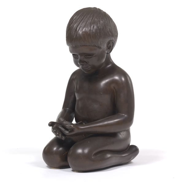 Appraisal: JOHN ROBINSON BRITISH - Boy with a Bird Patinated bronze