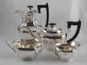 Appraisal: A four piece silver teaset of shaped panelled form by