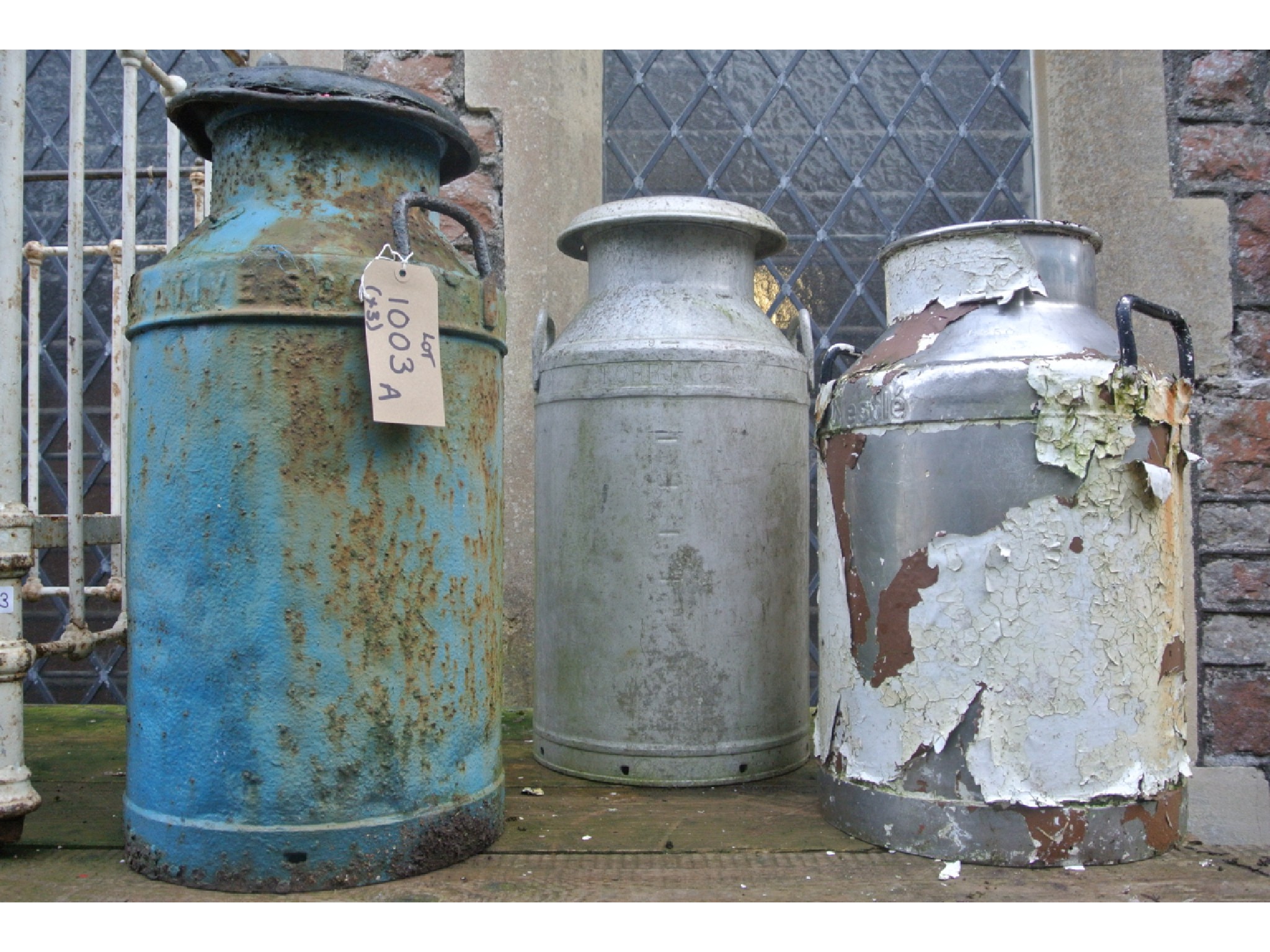 Appraisal: A vintage Co-Operative Society milk churn and cap with later