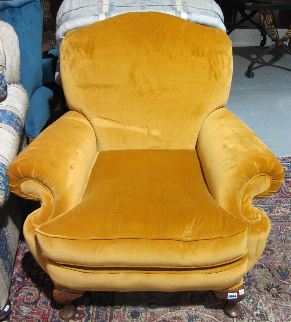 Appraisal: A th century mahogany framed yellow upholstered armchair