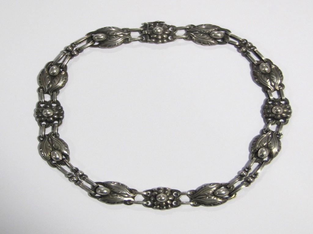 Appraisal: A Georg Jensen silver necklace with foliate and floral sections