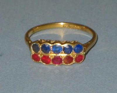 Appraisal: A VICTORIAN RUBY AND SAPPHIRE RING comprising five round-cut sapphires