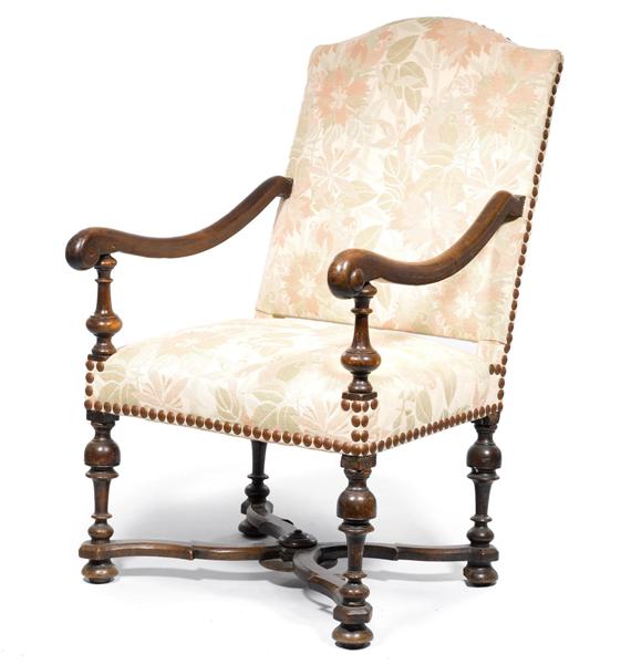 Appraisal: ARMCHAIR Louis XIV France Walnut Light-colored floral patterned cover