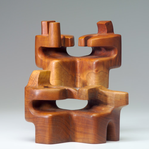 Appraisal: Carroll Barnes - Seated Figures two abstract carved wood sculptures