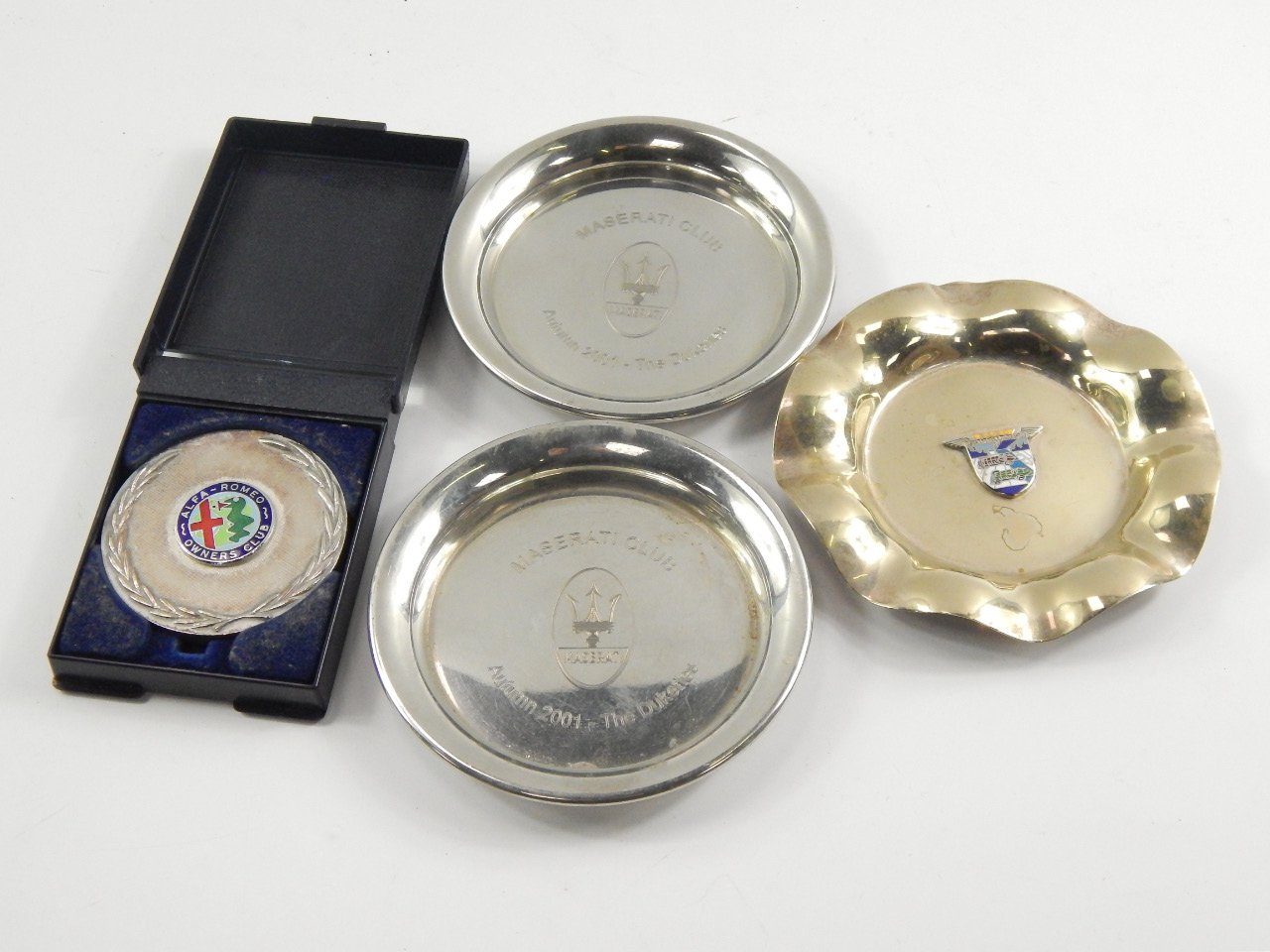 Appraisal: Maserati club ashtrays BARC ashtray and an Alfa Romeo concourse