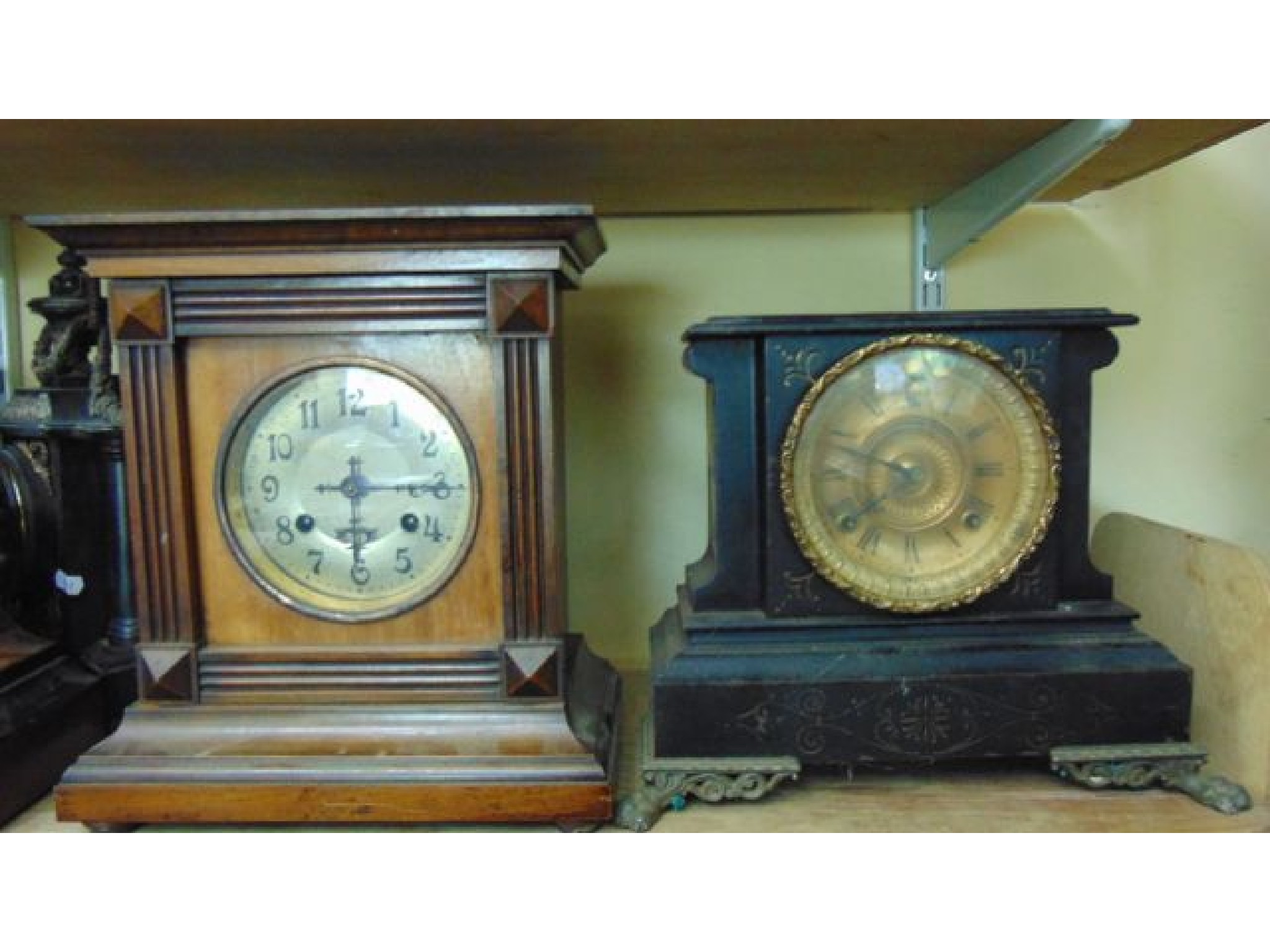 Appraisal: An Edwardian walnut bracket clock with applied and reeded detail