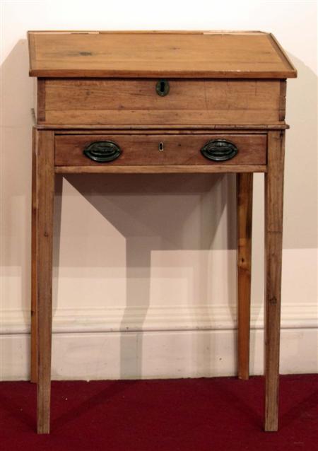 Appraisal: A th century pine clerk's desk the sloping hinged fall