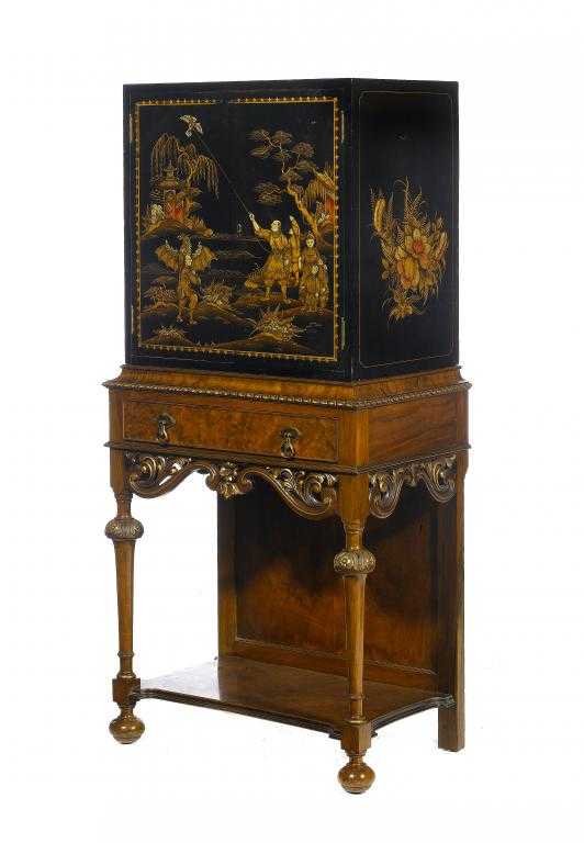 Appraisal: A BLACK AND GILT JAPANNED COCKTAIL CABINET the pair of