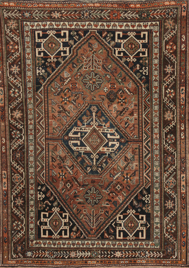 Appraisal: Shiraz Rug Post Shaded red ground with rosette and serrated