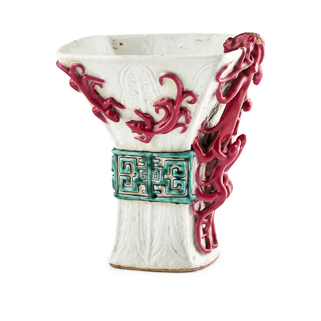 Appraisal: FAMILLE ROSE GU-FORM LIBATION CUP the exterior decorated with sinuous