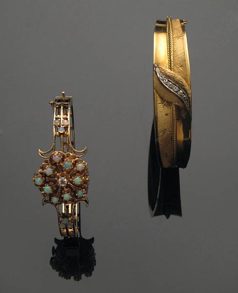 Appraisal: A collection of two gem-set and gold bangles featuring one