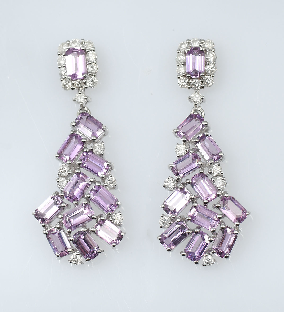 Appraisal: K PURPLE PINK SAPPHIRE DIAMOND PENDANT EARRINGS octagonal step cut