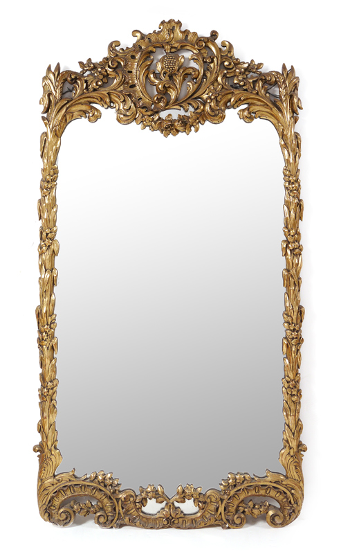 Appraisal: ROCOCO STYLE CARVED GILT WOOD MIRROR Carved and pierced frame