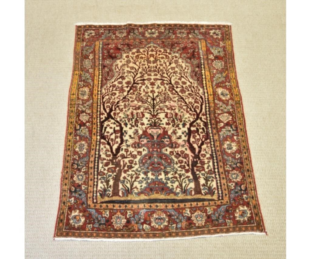 Appraisal: Persian tree of life directional garden carpet on a beige