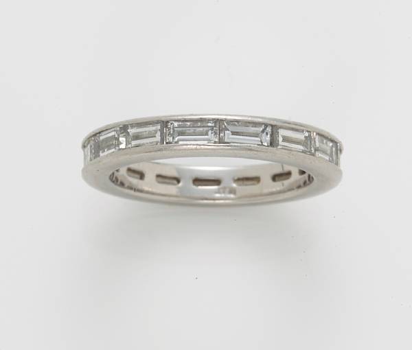 Appraisal: A diamond eternity band estimated total diamond weight carats mounted