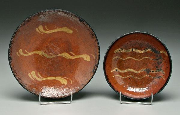 Appraisal: Two redware bowls both with slip decoration American th century