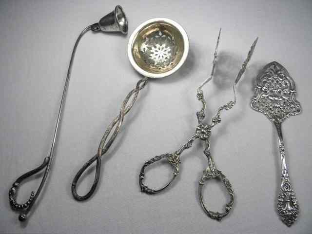 Appraisal: Lot of four assorted continental silver utensils Includes a ''