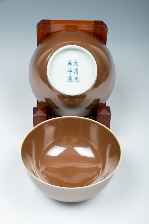 Appraisal: PAIR OF BROWN GLAZE BOWLS QING Each bowl in an