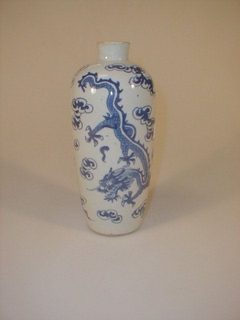 Appraisal: A Chinese earthenware flask of circular tapering form painted in