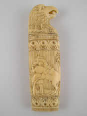 Appraisal: A finely carved ivory handle designed as an eagle's head