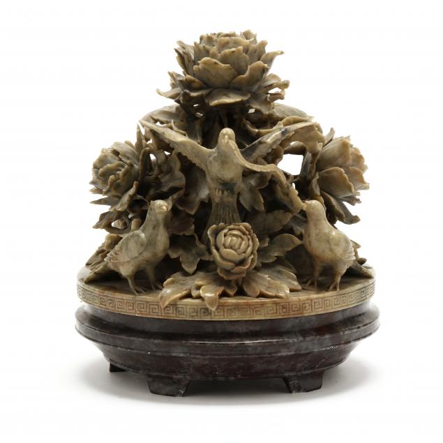 Appraisal: A CHINESE SOAPSTONE FLOWER AND BIRD CARVING th century a