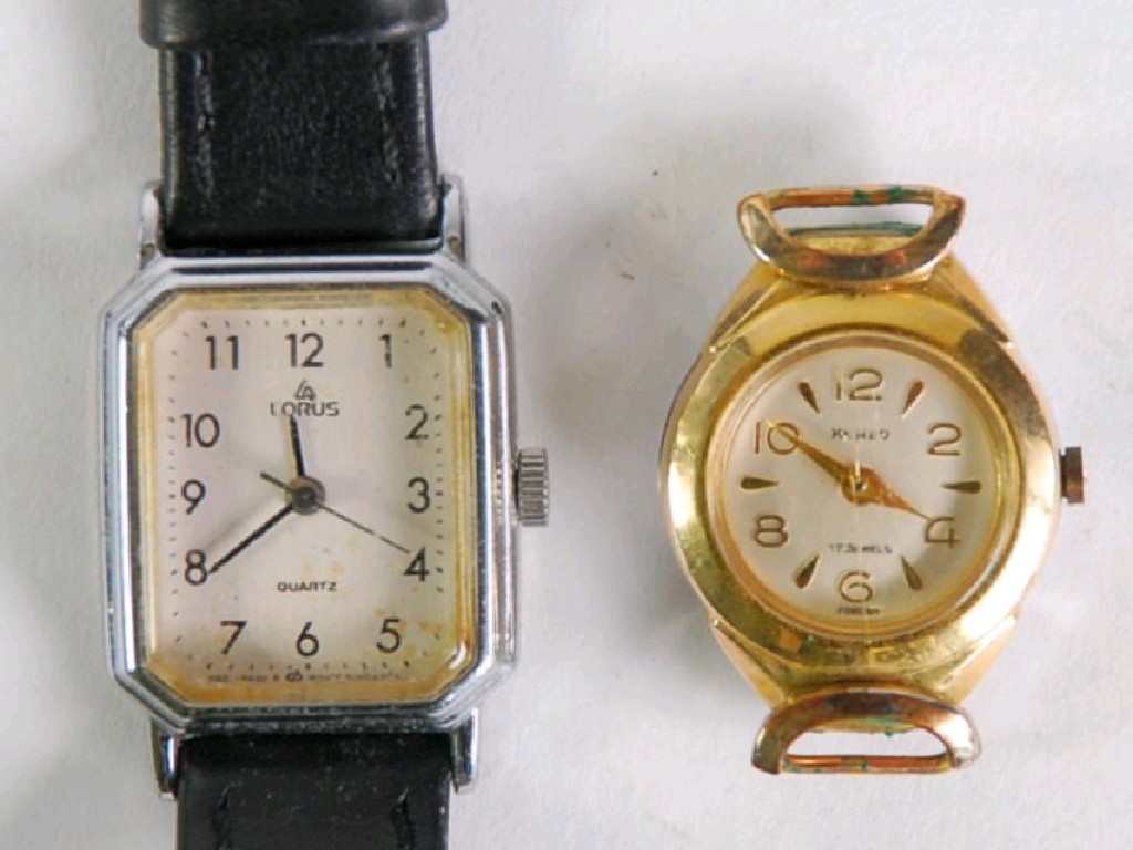 Appraisal: LADY'S LORUS METAL CASED WRIST WATCH with leather strap and