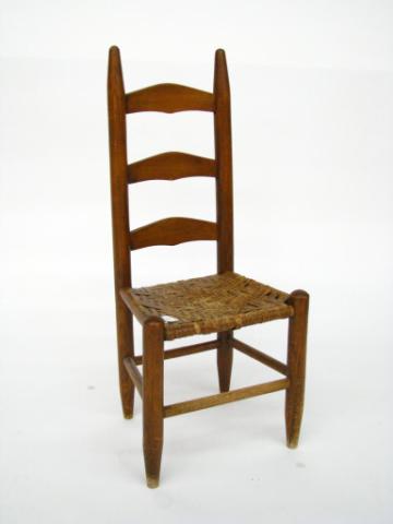 Appraisal: Child's antique ladderback chair with rush tied seat