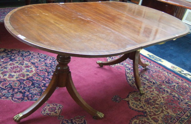 Appraisal: A Regency style mahogany 'D' end dining table the cross