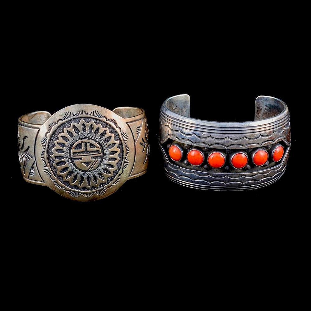 Appraisal: NAVAJO CUFF BRACELETS Two old pawn coral and silver cuff