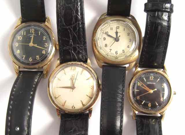 Appraisal: FOUR MEN'S VINTAGE WRISTWATCHES Omega automatic case ref GX- jewel