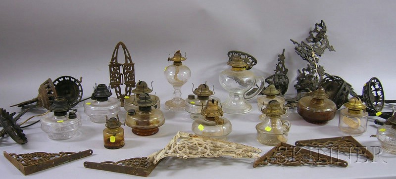 Appraisal: Fourteen Late Victorian Glass Kerosene Lamps with Assorted Cast Iron